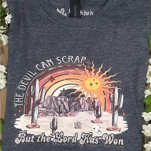 HTV on a Gildan SS/Dk Heather Tshirt..The devil can scrap, but the Lord has won